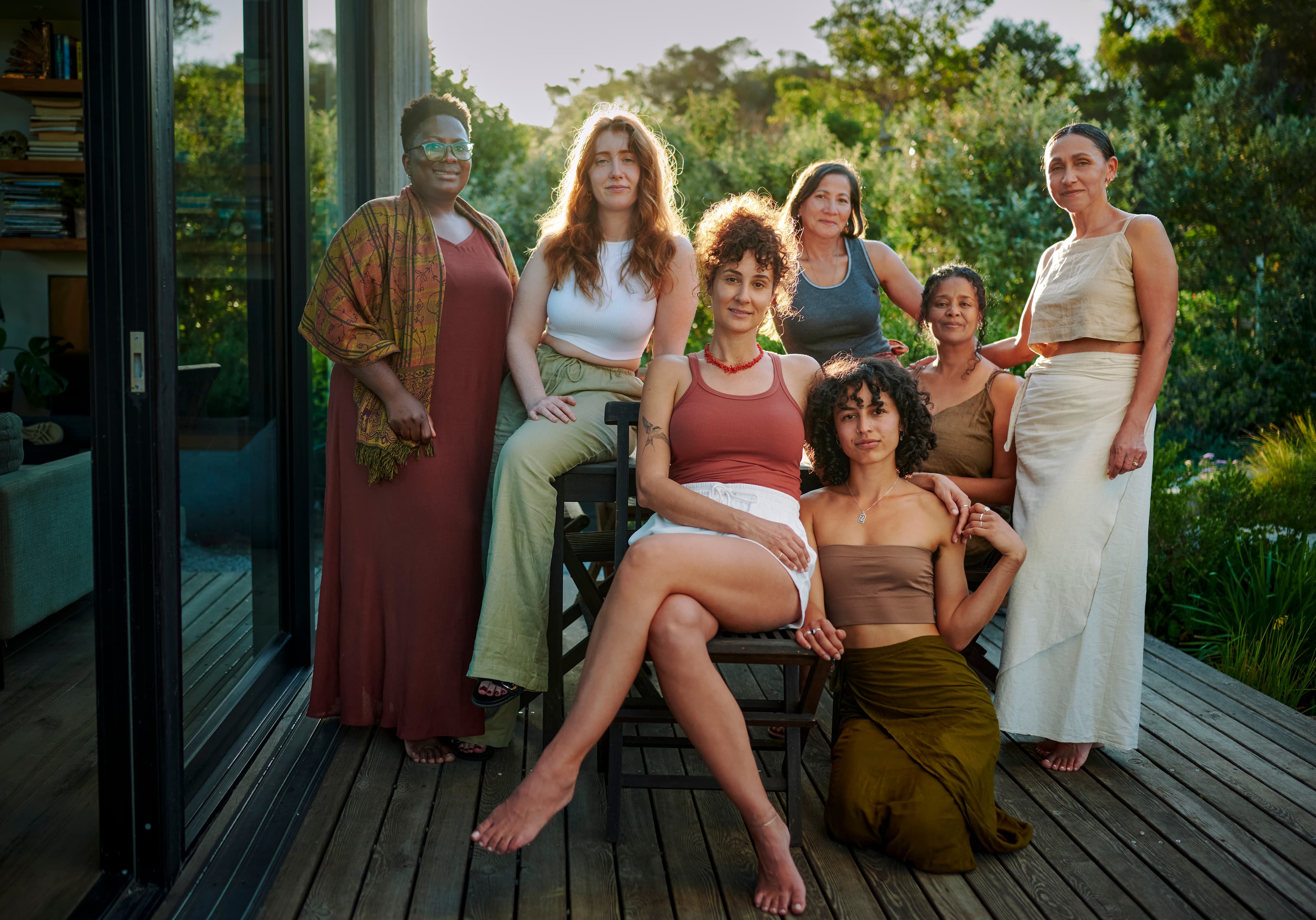 a groupd of women posing for a photo representing the diversity of customers at Blair Health